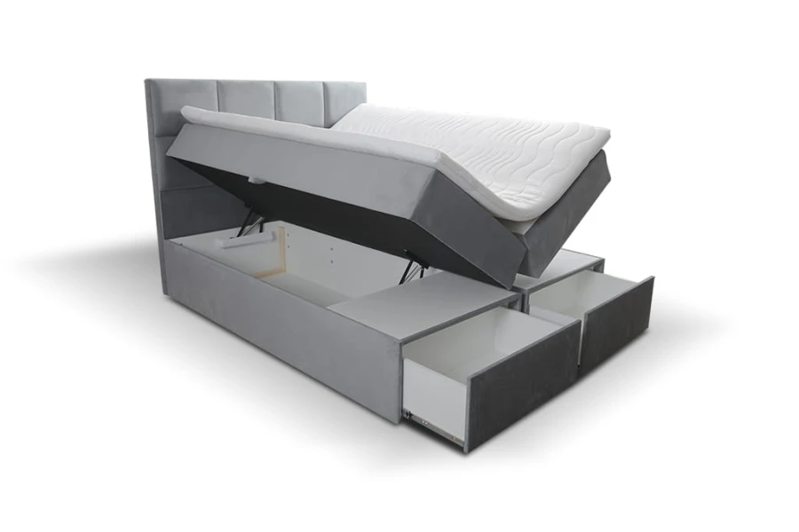 Funktionelles graues Polsterbett mit Bettkasten und Schubladen für viel Stauraum.