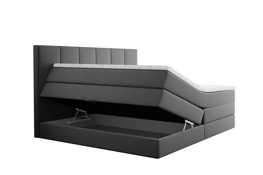 Dunkelgraues Boxspringbett mit offenem Bettkasten für zusätzlichen Stauraum unter der Matratze.