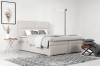 Modernes Boxspringbett in Hellgrau-Beige mit minimalistischem Kopfteil-Design