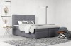 Modernes graues Boxspringbett mit hohem Kopfteil im Schlafzimmer Ambiente
