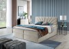 Elegantes Boxspringbett in Beige mit dekorativem Fächer-Kopfteil für ein gemütliches Schlafzimmer.