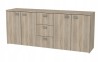 Modernes Sideboard in Sonoma Eiche Optik mit vier Türen und drei praktischen Schubladen.