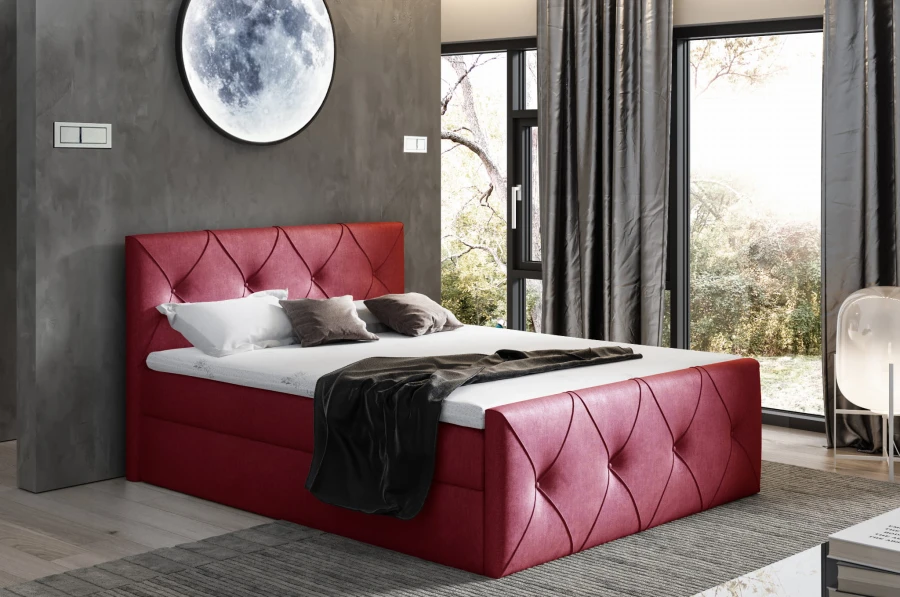 Elegantes weinrotes Boxspringbett mit gestepptem Kopfteil für exklusives Schlafzimmer-Design.