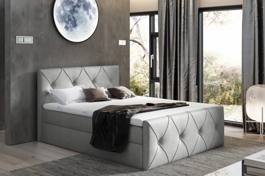 Modernes graues Polsterbett mit gestepptem Kopfteil und Mond-Wandlampe im Schlafzimmer.