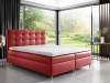 Modernes rotes Boxspringbett als Farbakzent in hellem Schlafzimmer-Design.