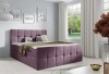 Violettes Boxspringbett mit quadratischer Steppung und gemütlichen Kissen.