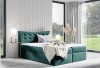 Boxspringbett in Petrol mit Samt-Bezug und elegantem Design für das Schlafzimmer.