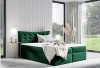 Dunkelgrünes Boxspringbett mit Polsterkopfteil und Samtstoff im modernen Design.
