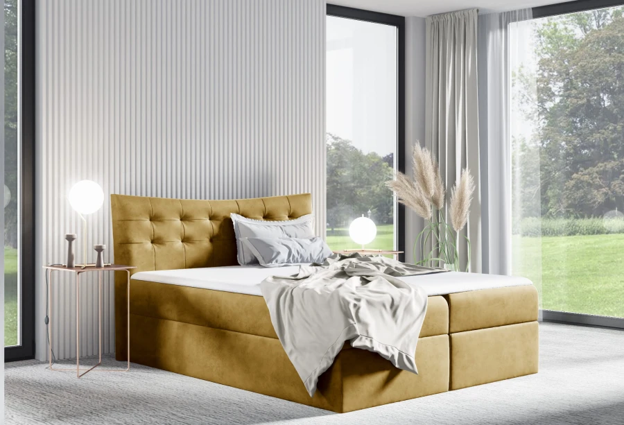Elegantes senfgelbes Boxspringbett mit weichem Bezug und Steppung.