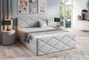 Stilvolles Boxspringbett in Hellgrau mit hochwertiger Rautensteppung.