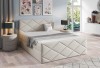 Gemütliches Boxspringbett in Beige mit zeitlosem Rautenmuster.