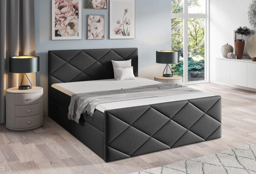 Dunkelgraues Boxspringbett mit elegantem Rautenmuster und modernen Lampen