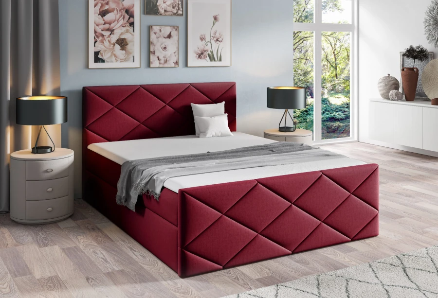 Modernes Polsterbett in Weinrot mit markanter Rautensteppung am Kopfteil für ein stilvolles Schlafzimmer.