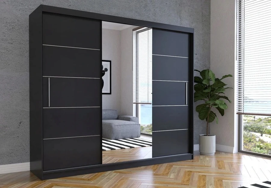 Large black wardrobe with sliding doors and mirror, minimalist design.
