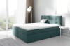 Modernes Boxspringbett in Petrol mit gestepptem Kopfteil im Schlafzimmer-Ambiente.