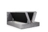 Graues Boxspringbett mit seitlich klappbarem Bettkasten und robustem Hebemechanismus.