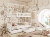 Bunk bed house shape in white in front of playful forest animal children's wallpaper.