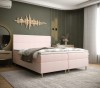 Modernes rosa Boxspringbett in stilvollem Schlafzimmer mit Wanddeko