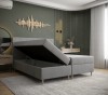 Graues Boxspringbett mit praktischem, offenem Bettkasten für Stauraum