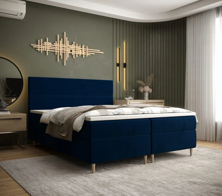 Stilvolles dunkelblaues Boxspringbett für ein modernes Schlafzimmer-Design