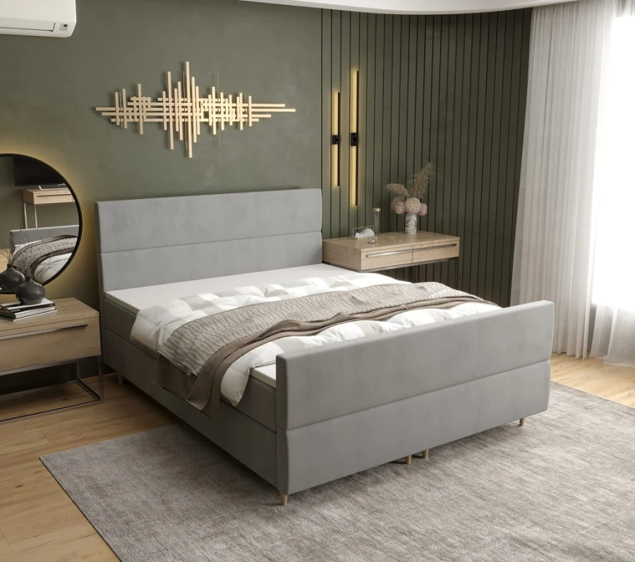 Graues Boxspringbett mit schlichtem Kopfteil für ein modernes Schlafzimmer
