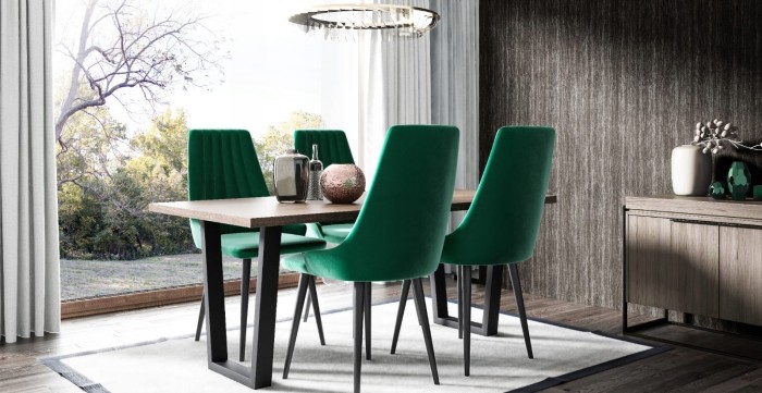 Modernes Esszimmer-Set mit grünen Samtstühlen und massivem Holztisch.