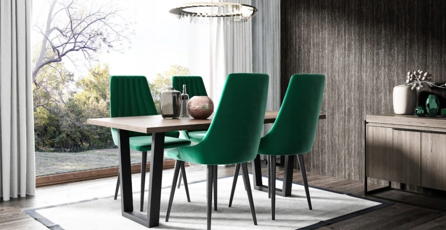Moderne eetkamerset met groene fluwelen stoelen en massief houten tafel.