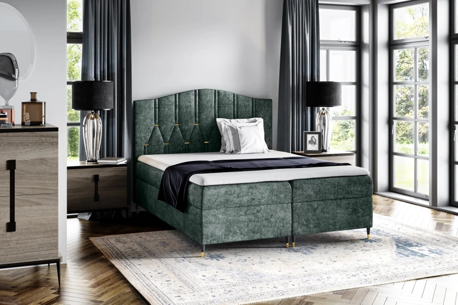Elegantes grünes Boxspringbett in modern eingerichtetem Schlafzimmer.