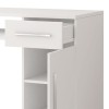 Close-up of white desk with open drawer and cupboard compartments