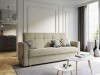 Elegante beige fluwelen bank in een lichte woonkamer met gezellige decoratie.
