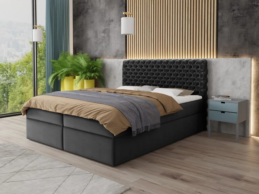 Modernes Boxspringbett in Schwarz mit gestepptem Kopfteil im stilvollen Schlafzimmer.