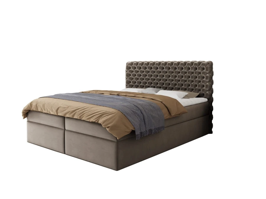 Taupefarbenes Boxspringbett mit eleganter Knopfheftung freigestellt auf Weiß.