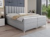 Modernes hellgraues Boxspringbett mit hohem gepolstertem Kopfteil für das Schlafzimmer.