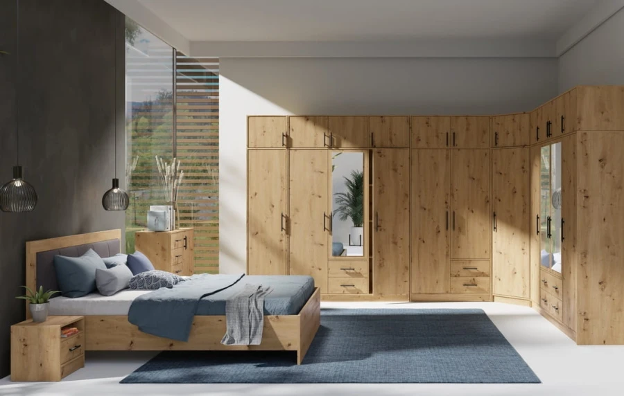 Komplettes Schlafzimmer-Set mit großem Eckkleiderschrank, Bett und Nachttisch in Holzoptik.
