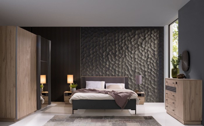 Modernes Schlafzimmer-Set mit Doppelbett, Kleiderschrank und strukturierter Wand.