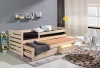 Funktionsbett aus Kiefer Natur mit ausziehbarer Liegefläche und Stauraum im Jugendzimmer.