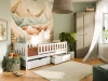 Einzelbett aus weißem Massivholz mit Bettschubladen in einem Kinderzimmer mit Natur-Design.
