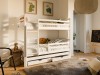 Space-saving bunk bed for three children made of white wood with an additional pull-out bed.