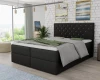 Modern boxspring bed in black with elegant crystal quilting on the headboard