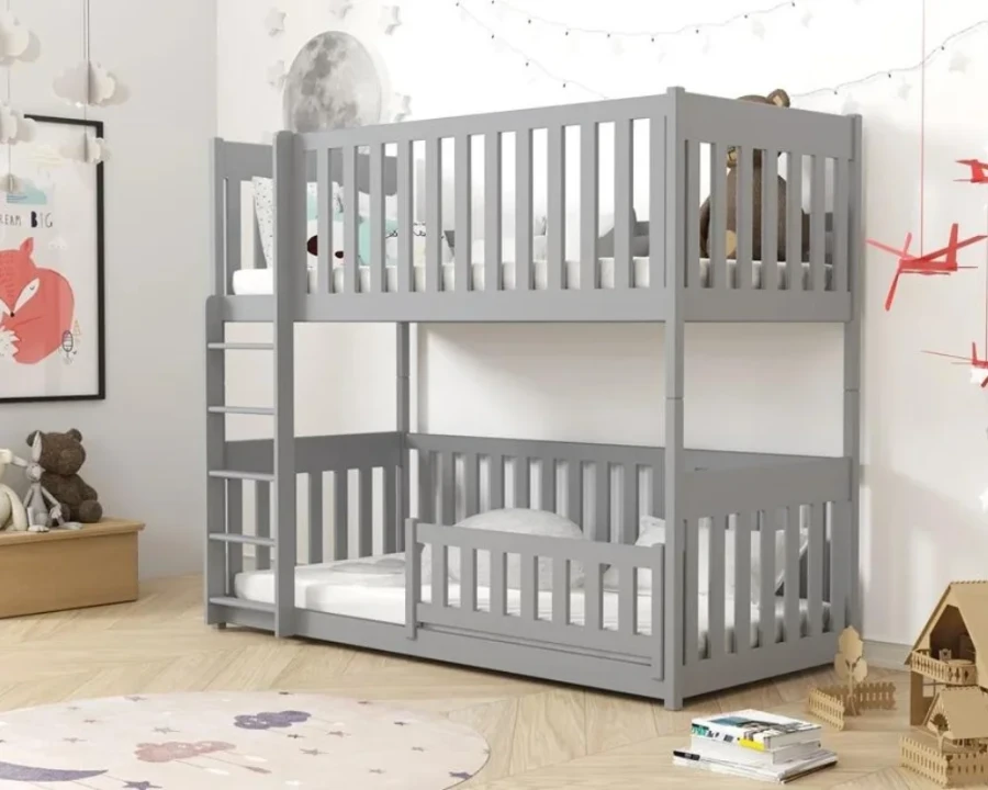 Grey wooden bunk bed in a children's room with secure safety rail and ladder.