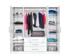 Interior view of wardrobe with clothes rail, shelves and boxes.