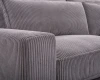 Nahaufnahme der grauen Cord-Struktur eines modernen Sofas für ein gemütliches Wohngefühl.