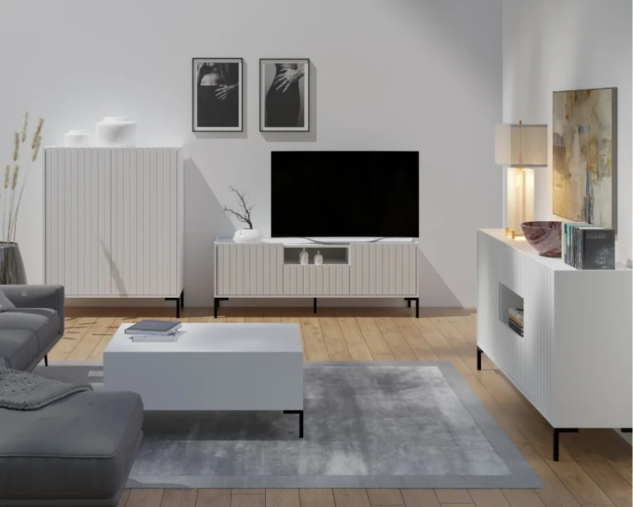 Minimalist living room set in white with slatted fronts on the sideboard, TV board and table.
