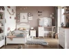 Komplettes Kinderzimmer-Set in Weiß und Rosa mit Bett, Schreibtisch und Schrank.