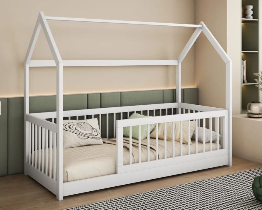 Weißes Hausbett für Kinder mit Rausfallschutz im modernen Kinderzimmer Design.