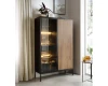 Geschlossenes schwarzes Highboard mit Lamellenfront aus Holz in stilvoller Wohnumgebung.