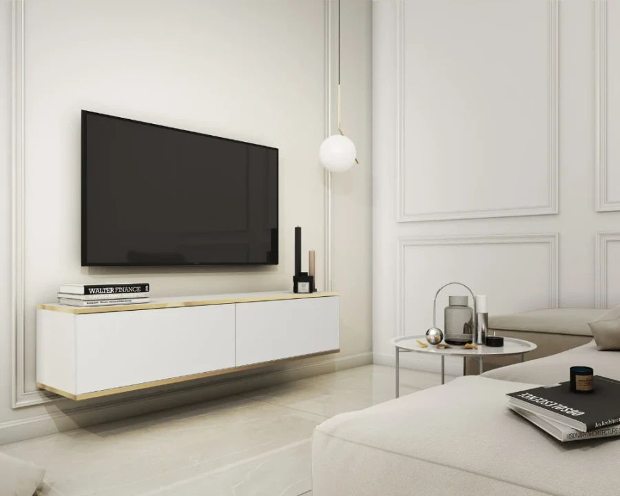 Weißes hängendes TV-Lowboard mit Goldrand in elegantem Wohnzimmer-Interieur.