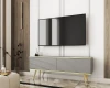 Modernes graues TV-Board mit geriffelter Front, goldenen Akzenten und eleganten Goldfüßen.