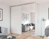 Weißer Schwebetürenschrank mit großer Spiegelfront in hellem Zimmer.
