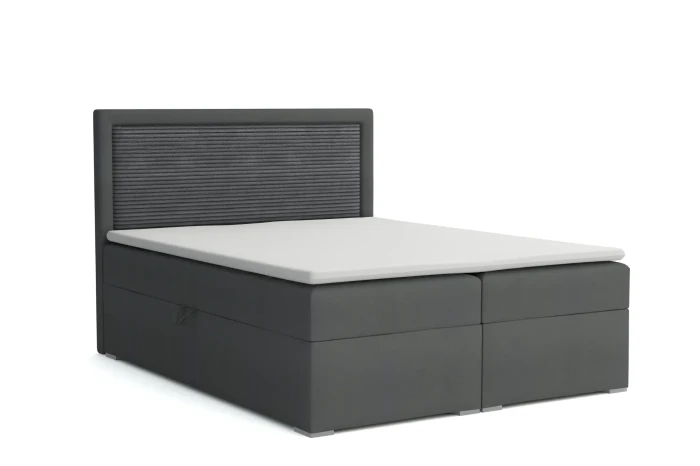 Stilvolles Boxspringbett in Graphit mit gestepptem Kopfteil und weißer Matratze.